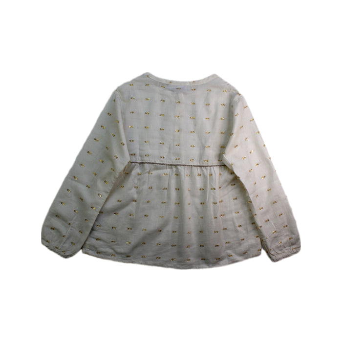 A Beige Long Sleeve Tops from La Compagnie des Petits in size 5T for girl. (Back View)