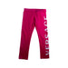 A Pink Leggings from Young Versace in size 5T for girl. (Front View)