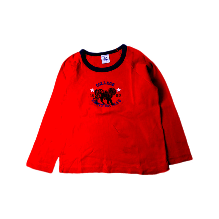 A Red Long Sleeve T Shirts from Petit Bateau in size 5T for boy. (Front View)
