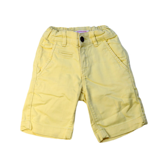 A Yellow Shorts from Monoprix in size 5T for boy. (Front View)