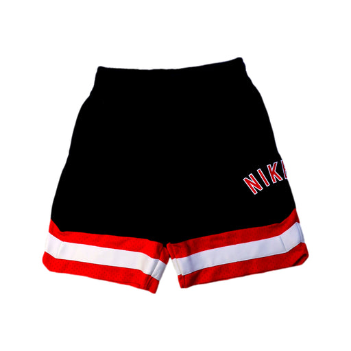 A Black Shorts from Nike in size 6T for boy. (Front View)