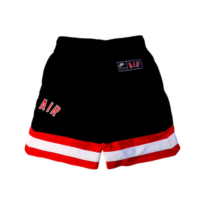 A Black Shorts from Nike in size 6T for boy. (Back View)