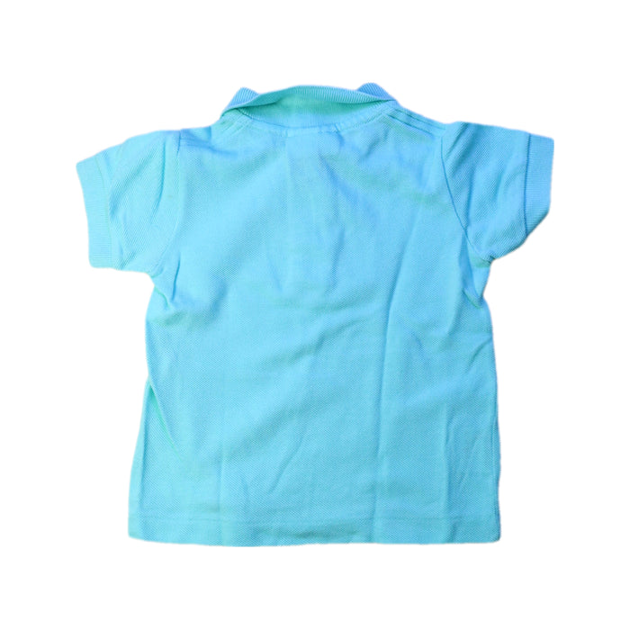 A Blue Short Sleeve Polos from Lacoste in size 6-12M for boy. (Back View)