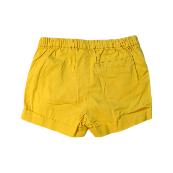 A Yellow Shorts from Jacadi in size 6-12M for girl. (Back View)