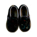 A Black Slip Ons from Vans in size 18-24M for boy. (Back View)