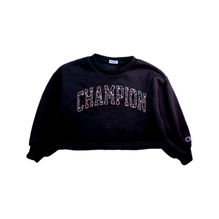 A Black Crewneck Sweatshirts from Champion in size 4T for girl. (Front View)