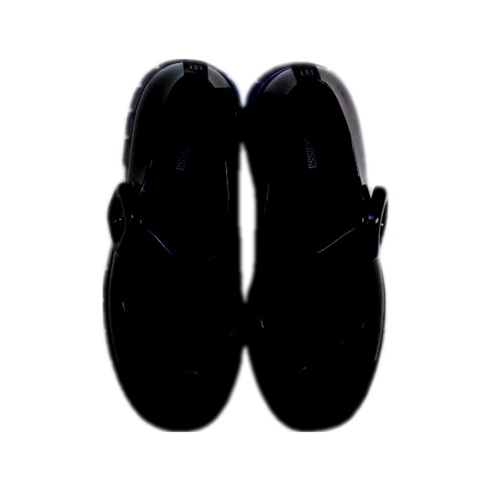 A Black Flats from Mini Melissa in size 7Y for girl. (Back View)