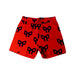 A Orange Shorts from Mini Rodini in size 6T for girl. (Front View)