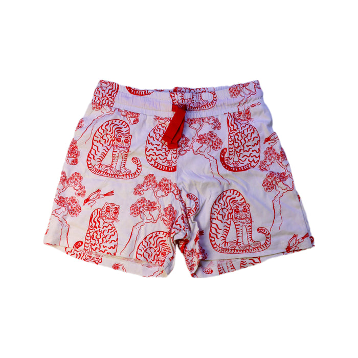A Red Shorts from Mini Rodini in size 6T for girl. (Front View)