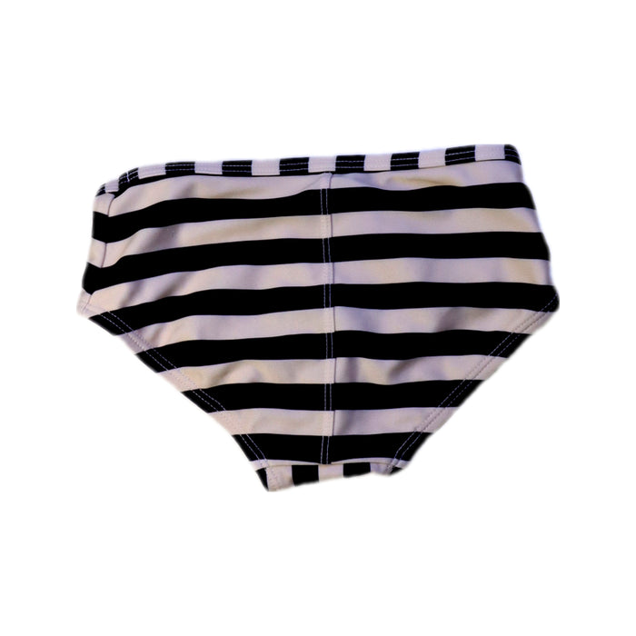 A Black Swim Shorts from Tea in size 4T for girl. (Back View)