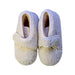 A White Booties from Jacadi in size 18-24M for neutral. (Back View)