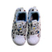 A White Sneakers from Adidas in size 5T for girl. (Back View)