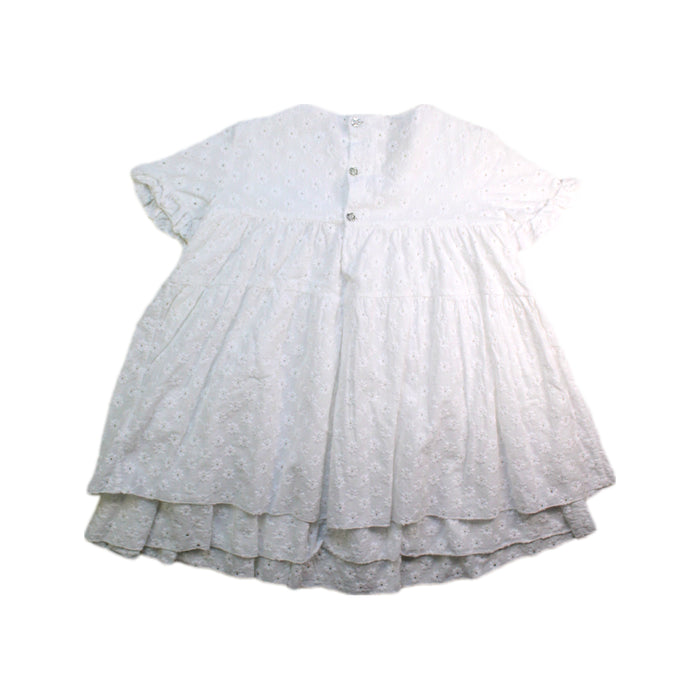 A White Short Sleeve Dresses from Nanos in size 4T for girl. (Back View)