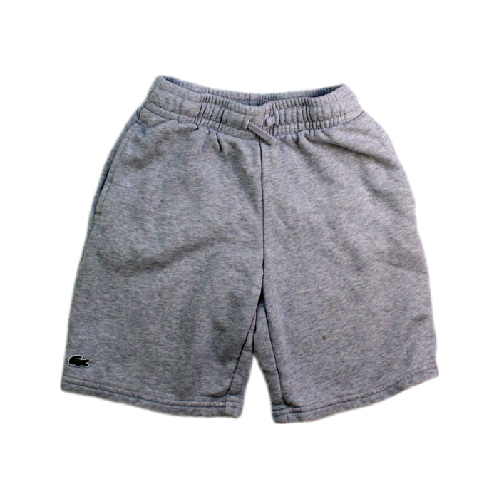 A Grey Shorts from Lacoste in size 8Y for neutral. (Front View)