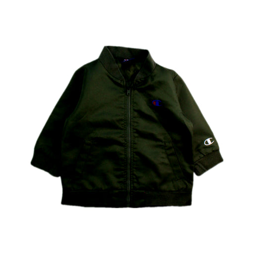 A Black Lightweight Jackets from Champion in size 12-18M for boy. (Front View)