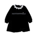 A Black Long Sleeve Dresses from Petit Main in size 4T for girl. (Front View)