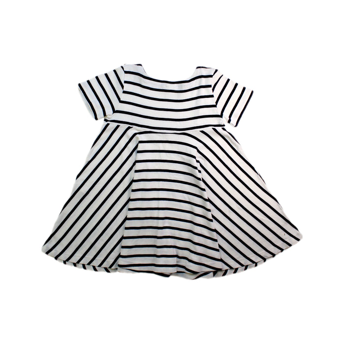 A Black Short Sleeve Dresses from Petit Bateau in size 4T for girl. (Back View)