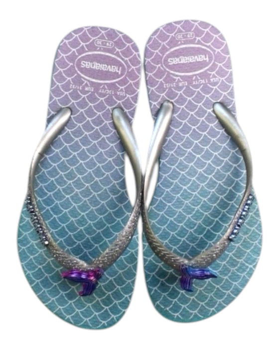 A Purple Flip Flops from Havaianas in size 6T for girl. (Back View)