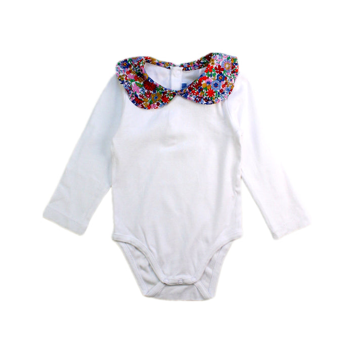 A White Long Sleeve Bodysuits from Jacadi in size 12-18M for girl. (Front View)