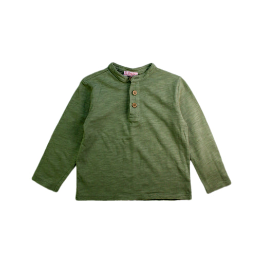 A Green Long Sleeve T Shirts from La Coqueta in size 4T for boy. (Front View)