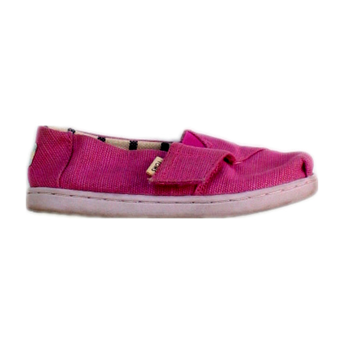 A Pink Slip Ons from Toms in size 4T for girl. (Front View)