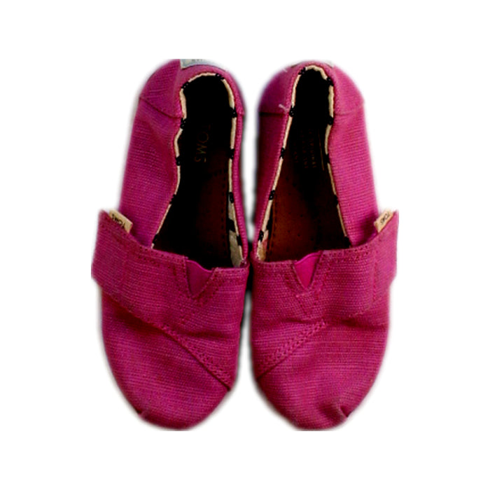 A Pink Slip Ons from Toms in size 4T for girl. (Back View)