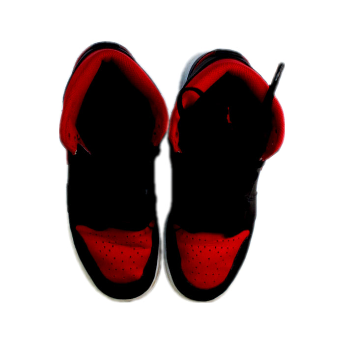 A Black Sneakers from Air Jordan in size 12Y for boy. (Back View)