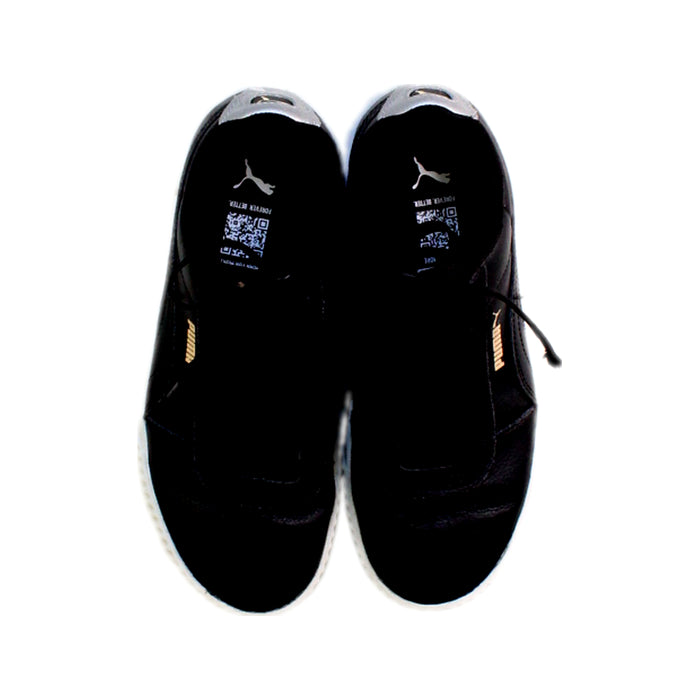 A Black Sneakers from Puma in size 12Y for boy. (Back View)