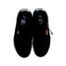 A Black Sneakers from Puma in size 12Y for boy. (Back View)