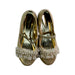 A Gold Flats from Monsoon in size 7Y for girl. (Back View)