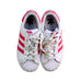 A White Sneakers from Adidas in size 7Y for girl. (Back View)