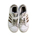 A White Sneakers from Adidas in size 7Y for girl. (Back View)