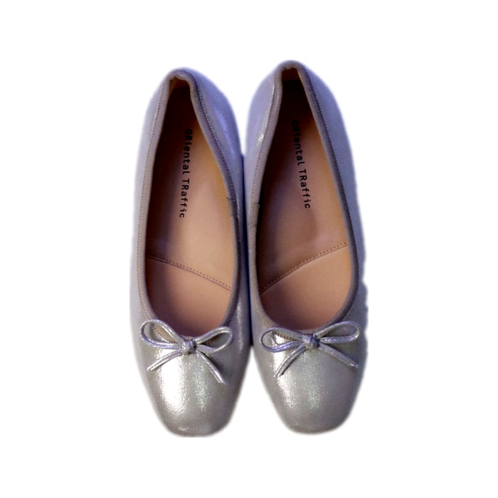 A Silver Flats from Oriental Traffic in size 9Y for girl. (Back View)