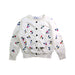 A White Cardigans from Bonpoint in size 6T for girl. (Front View)