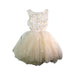 A Ivory Sleeveless Dresses from Britt in size 5T for girl. (Front View)