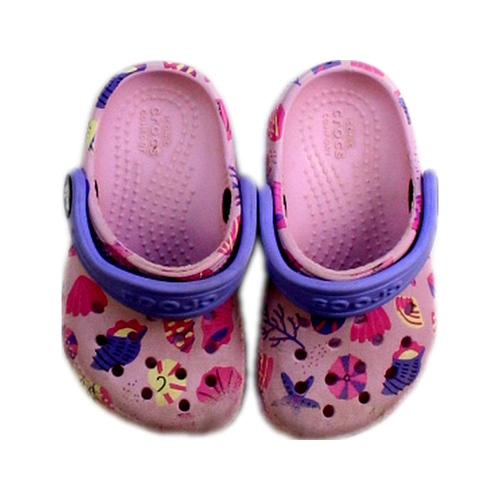 A Pink Slip Ons from Crocs in size 12-18M for girl. (Back View)
