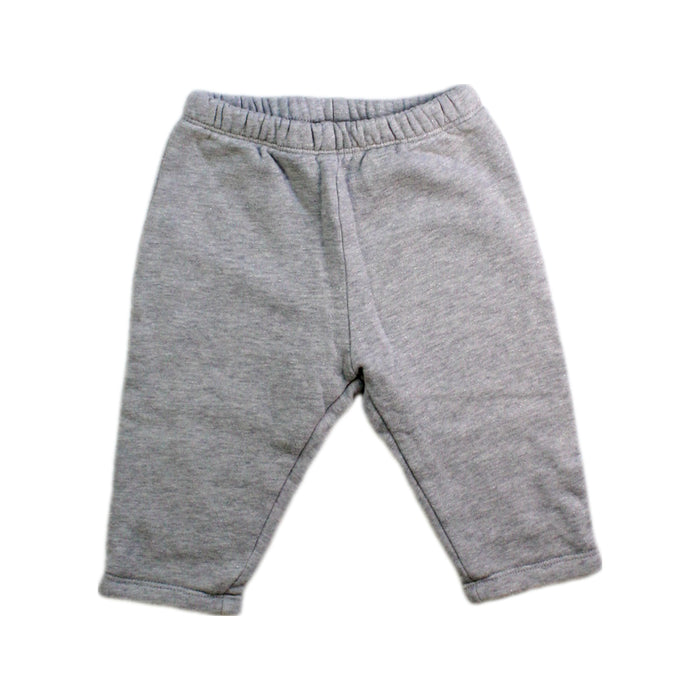 A Grey Sweatpants from Chickeeduck in size 6-12M for girl. (Front View)