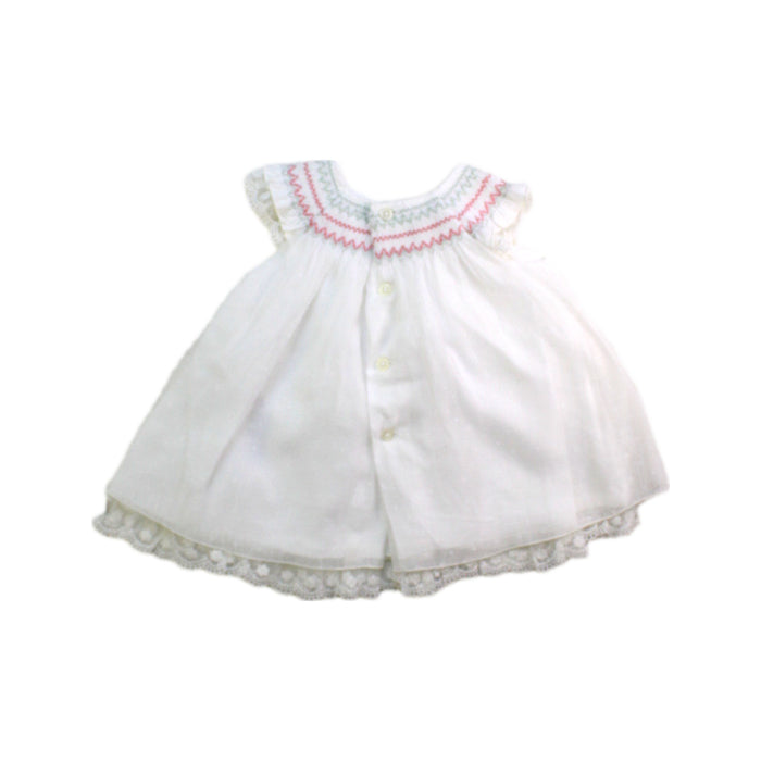 A White Sleeveless Dresses from Paz Rodriguez in size Newborn for girl. (Back View)