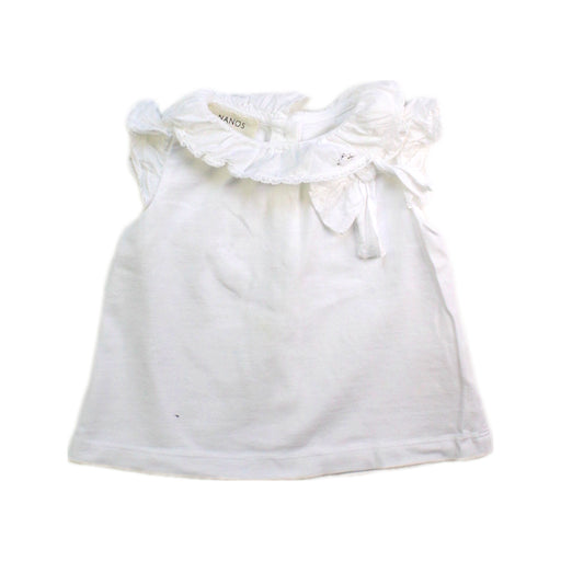 A White Sleeveless Tops from Nanos in size 6-12M for girl. (Front View)