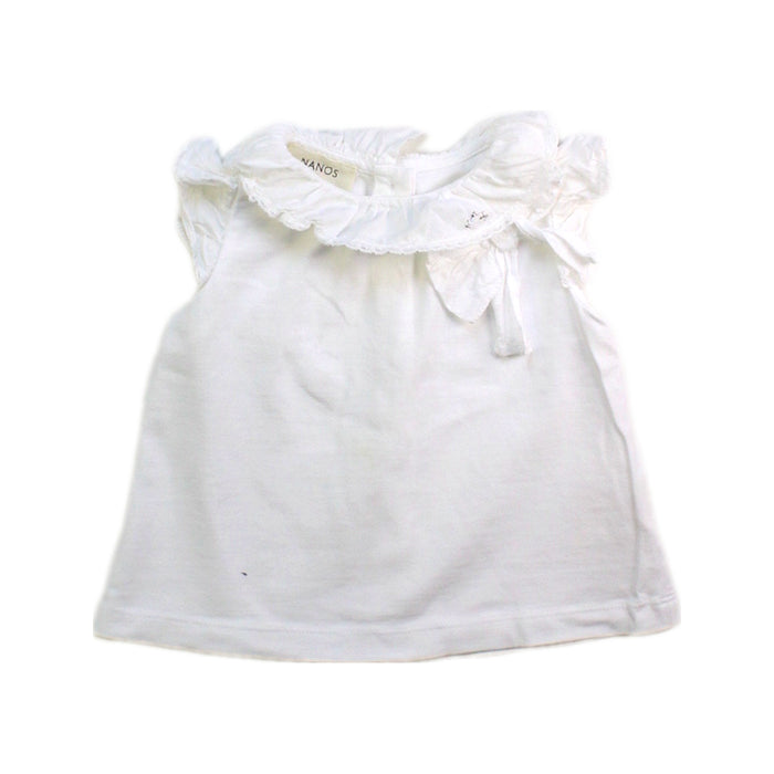 A White Sleeveless Tops from Nanos in size 6-12M for girl. (Front View)