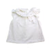A White Sleeveless Tops from Nanos in size 6-12M for girl. (Front View)