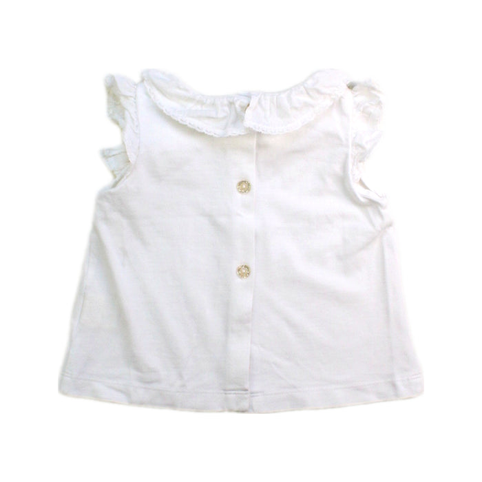 A White Sleeveless Tops from Nanos in size 6-12M for girl. (Back View)