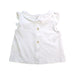 A White Sleeveless Tops from Nanos in size 6-12M for girl. (Back View)