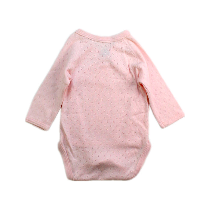 A Pink Long Sleeve Bodysuits from Petit Bateau in size Newborn for girl. (Back View)