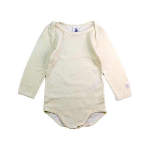 A Ivory Long Sleeve Bodysuits from Petit Bateau in size 12-18M for neutral. (Front View)
