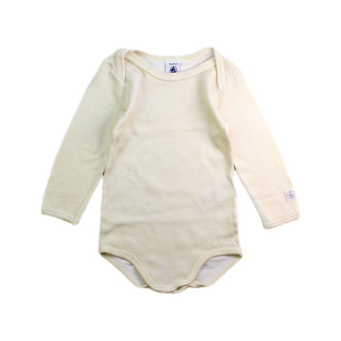 A Ivory Long Sleeve Bodysuits from Petit Bateau in size 12-18M for neutral. (Front View)