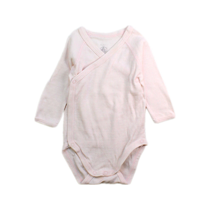 A Pink Long Sleeve Bodysuits from Petit Bateau in size 0-3M for girl. (Front View)