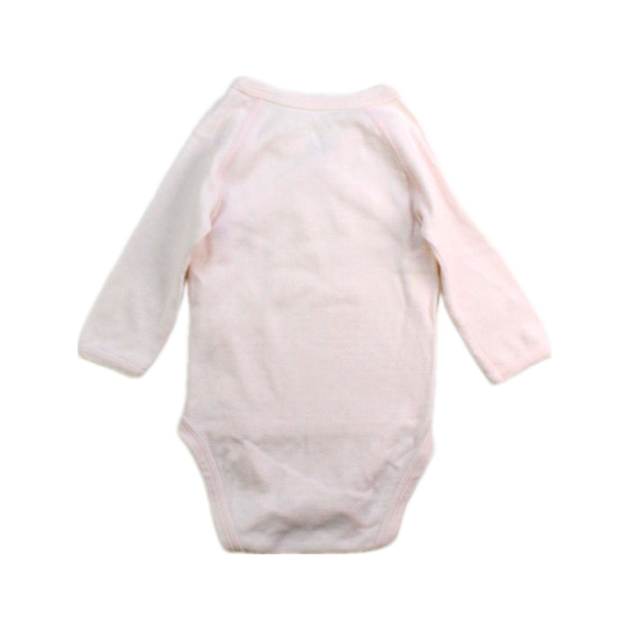 A Pink Long Sleeve Bodysuits from Petit Bateau in size 0-3M for girl. (Back View)