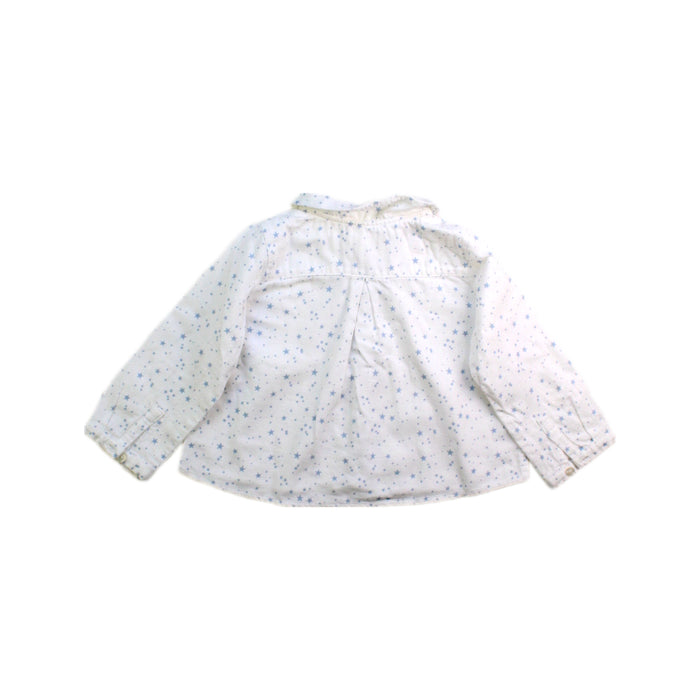 A White Long Sleeve Shirts from Nanos in size 6-12M for boy. (Back View)