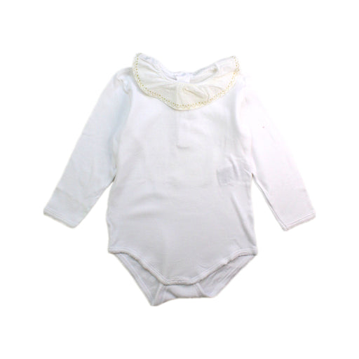 A White Long Sleeve Bodysuits from Bonpoint in size 2T for girl. (Front View)